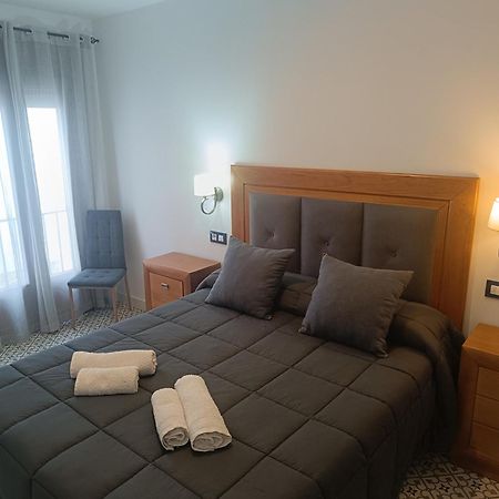 Al-Qazeres Suites Caces Extérieur photo
