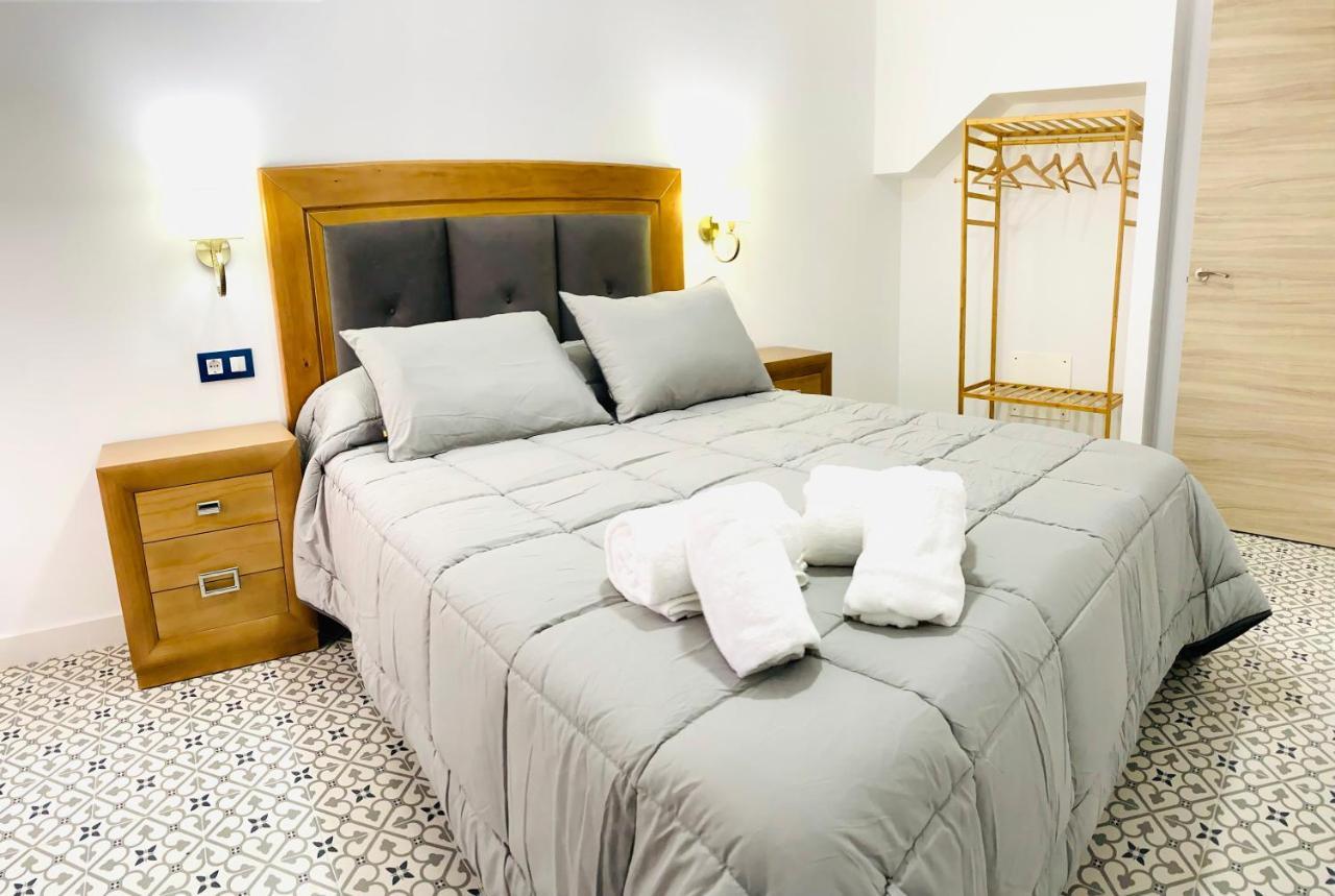 Al-Qazeres Suites Caces Extérieur photo
